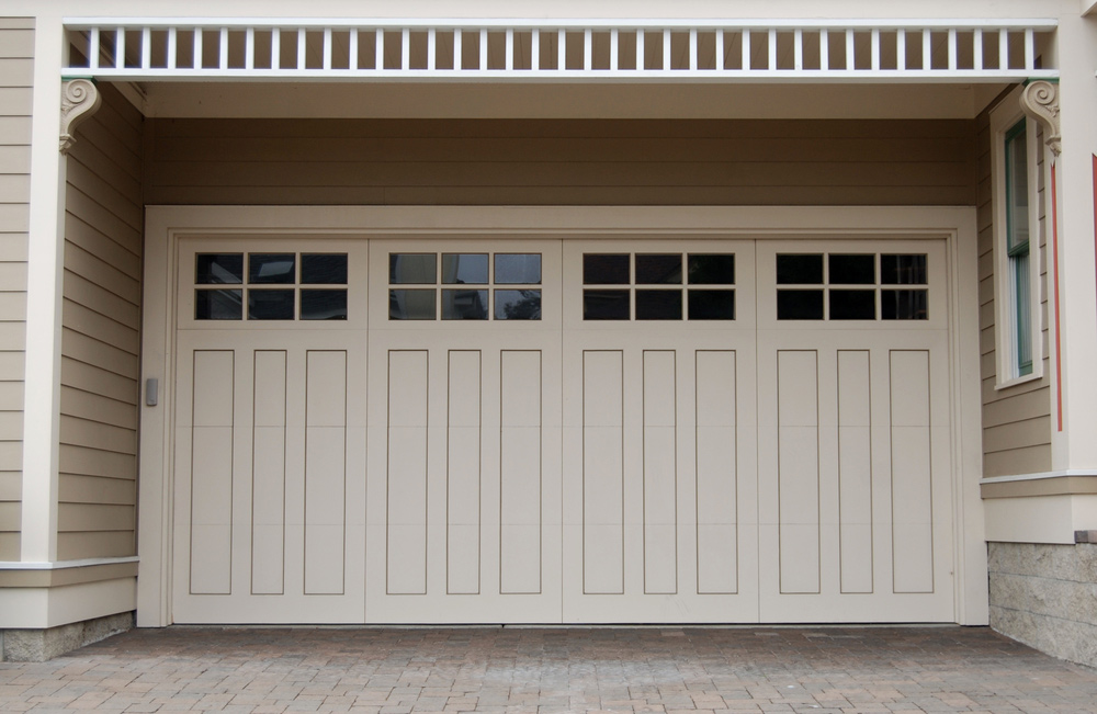 You are currently viewing Should I Repair Or Replace My Garage Door?