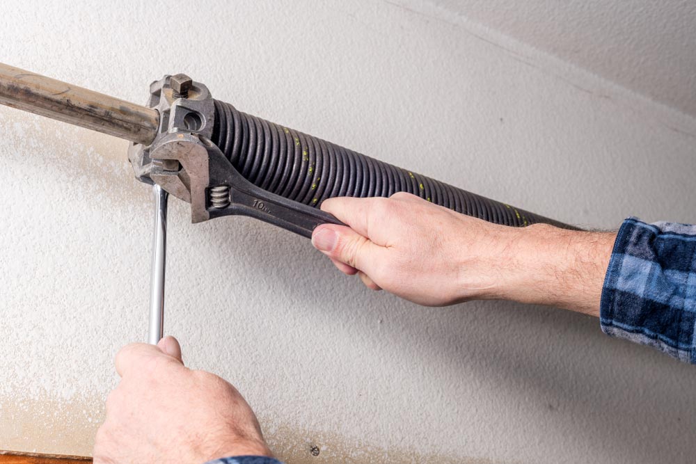Read more about the article Signs Your Garage Door Spring Is Broken